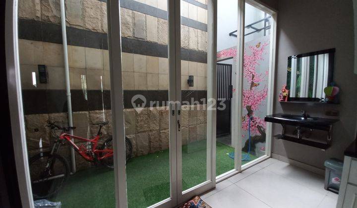 DI SEWAKAN RUMAH PAKUWON INDAH MANSION 2 LT BAGUS 2