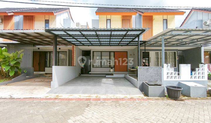 Rumah Modern Carport Luas 10 Menit ke RS Dr.M.Hassan Toto Dibantu KPR J26351 1