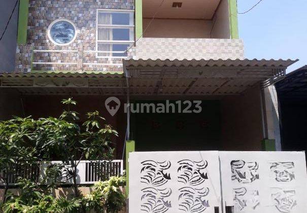 Dijual Rumah 2 Lantai Bagus Terawat di Perum Griya Sepanjang 1