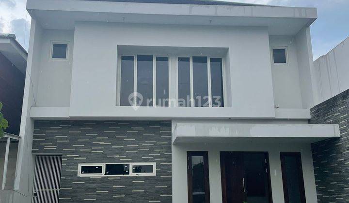 Rumah Dian Istana kamar 4+1 harga 65jt dekat tol 2