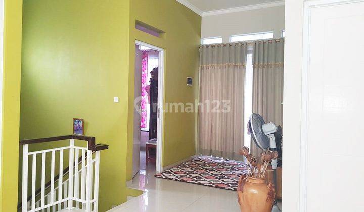 Dijual cepat BU! Rumah dalam cluster nempel graha Raya  2