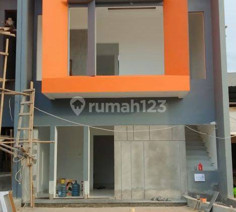 Rumah Baru 2 Lantai Modern minalis nempel jalan utama akses besar 5