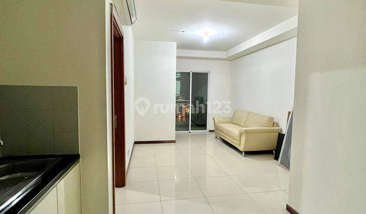 Sewa Termurah Condominium Greenbay Pluit 2BR Semi Furnish View Laut 1