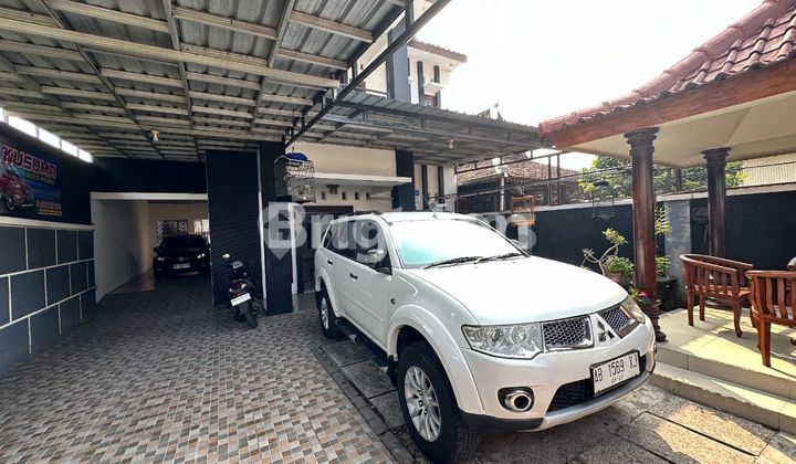 asphalt-roofed two-story house 2