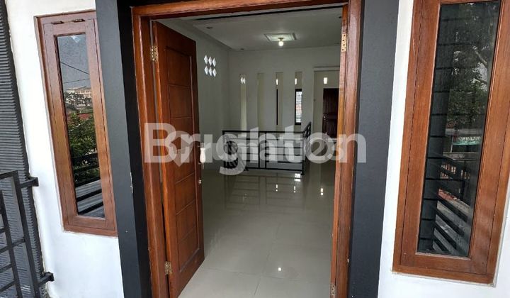 asphalt-roofed two-story house