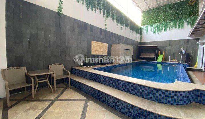  Disewakan Rumah Bagus di Harapan Indah Dengan Kolam Renang 1