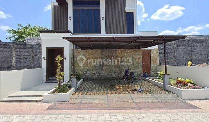 Rumah 2 Lantai Modern Kontemporer Dalam Perumahan di Sleman 1