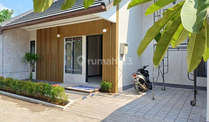 Rumah Konsep Rustic Modern Minimalis di Kalasan, Sleman 1