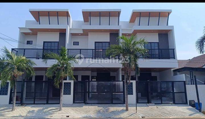 Rumah Design Modern 2 Lantai Siap Huni di Harapan Indah 2 1