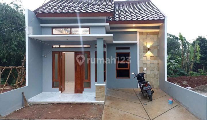 Rumah di jual, strategis dan bebas banjir,dekat pintu tol sawangan depok 9