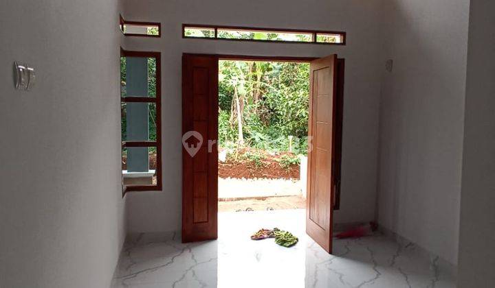 Rumah di jual, strategis dan bebas banjir,dekat pintu tol sawangan depok 23