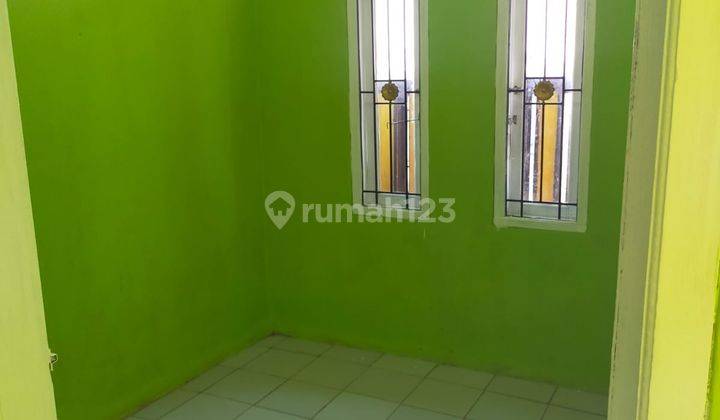 Rumah di jual murah lokasi strategis dan bebas dari banjir,dekat dengan stasiun dan jalur angkot 5