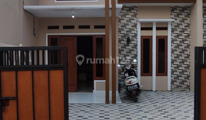 Di jual murah rumah cluster di kota depok, dekat pintu tol sawangan, stasiun, lokasi sangat strategis, aman dan nyaman bebas dari banjir  1