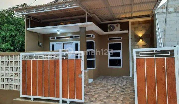 Rumah cluster di jual murah sawangan Depok, dekat pintu tol sawangan, stasiun, lokasi strategis aman, nyaman dan bebas dari banjir 1