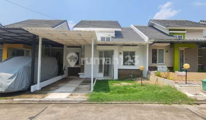 Clean, Ready-to-Live-In House for Rent! Located in the Premier Cluster of Serpong Garden, Green View Cluster, Direct Access from Jl. Raya Cisauk. Land Area: 84 m2 Building Area: 45 m2 Bedrooms: 2 Bathrooms: 1 Orientation: East Number of Floors: 1 Water: Well Water Equipped with a Filter