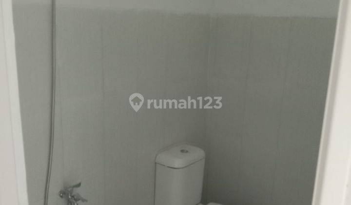 Rumah kota Sidoarjo lokasi nol jalan raya 2
