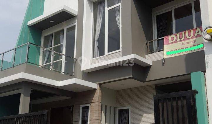 Rumah 2lantai di tengah kota 1