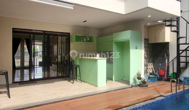 Rumah System Modern Dengan Kolam Renang di Kota Baru Parahyagan 2