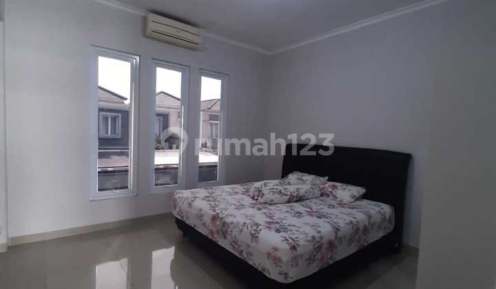 kamar tidur rumah terawat semi furnish 2