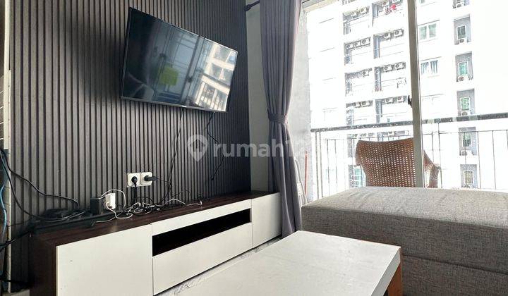 Apartement City Home Moi 2 BR Furnished Bagus 1