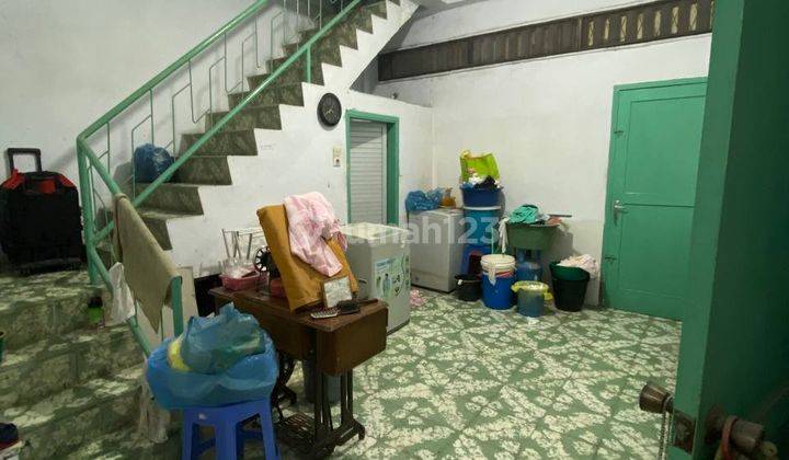 Rumah Hook daerah Asia di Jl.Pasir - Sabaruddin lebar 7m 4