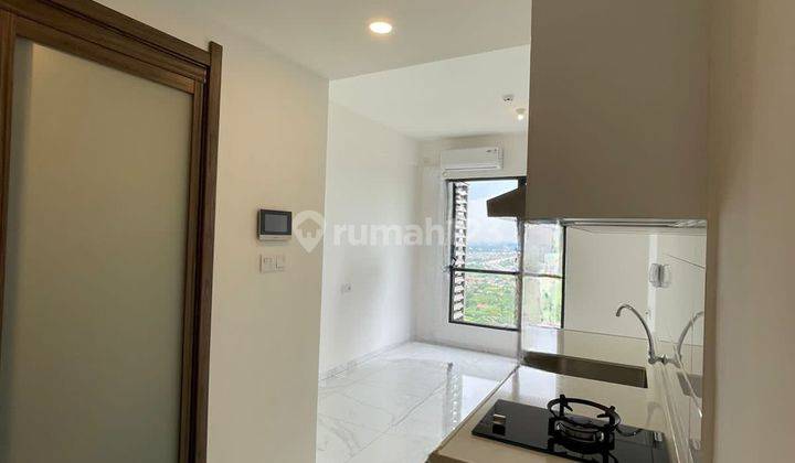 Sewa Murah Apartemen Sky House Type Studio Semi Furnished Baru 2