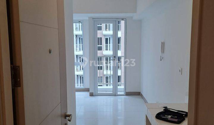 Apartemen Tokyo Riverside Pik 2 Studio 21m2 Kosongan Jual Rugi 1