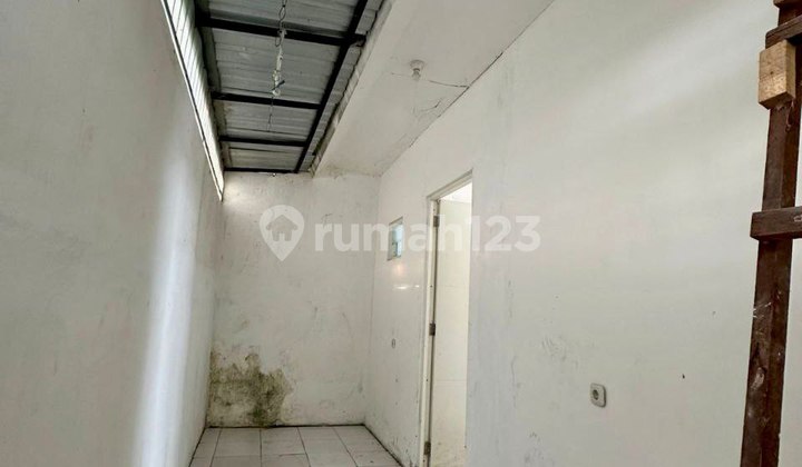 Selling at a Loss: Grand Sunrise Menganti Cluster Explanade House 2