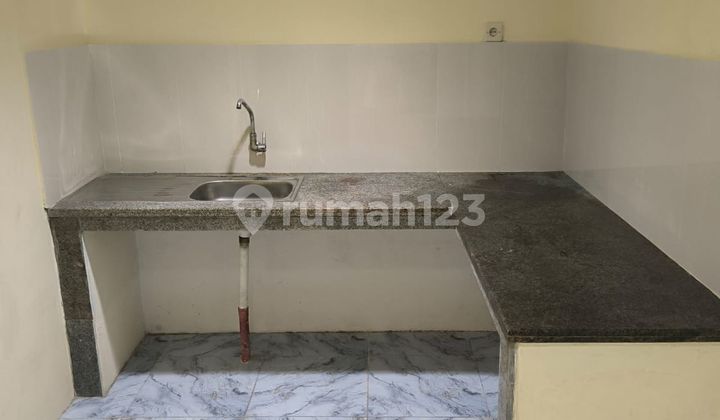 Rumah Strategis 14 Menit ke Stasiun Batu Ceper Siap Huni Bebas Banjir J35892