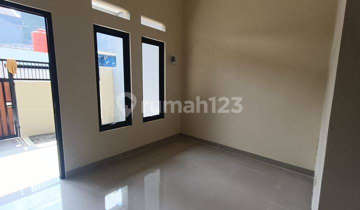 Rumah SHM 10 menit ke Plaza Taman Harapan Baru Dibantu KPR J32211 2