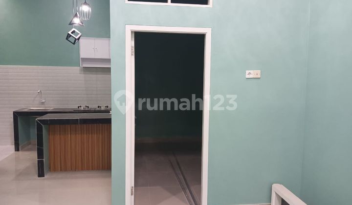 Rumah Strategis Siap Huni Dekat Plaza Taman Harapan Baru Dibantu KPR J-33536 2