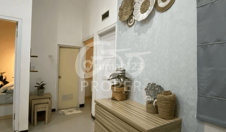 kamar tidur rumah furnished dijual di graha