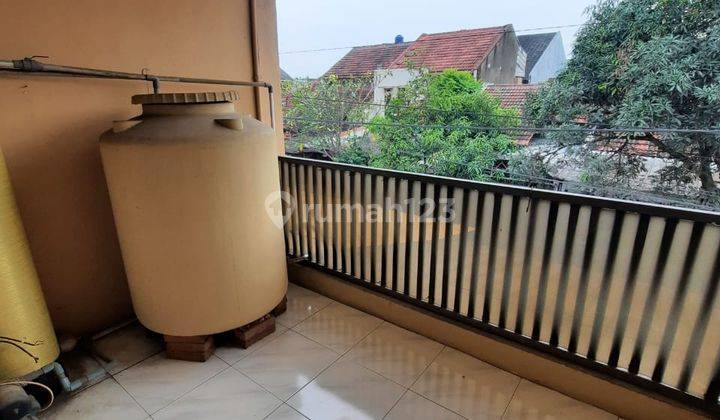 Termurah ! Disewakan Rumah Asri Taman Holis Indah Semi Furnish 2