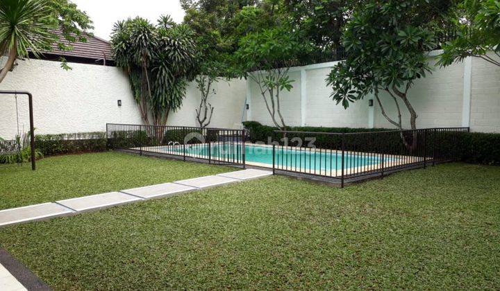 A 1 Storey, 4 Bedroom, Stand Alone House Located In Pejaten, Jakarta With 3 Bathrooms, A Pool And A Yard. 1