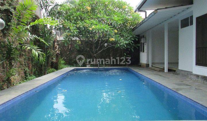 A 1 storey, 4 bedroom, stand alone house located in Cipete, Jakarta with 3 bathrooms, a pool and a yard. 1