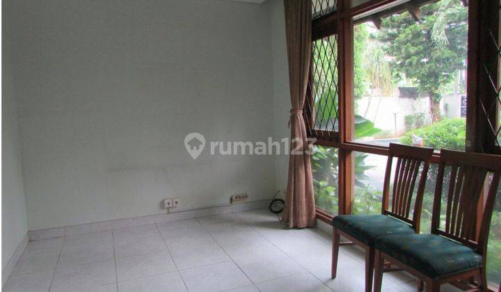 A 2 storey, 4 bedroom, compound house located in Cipete, Jakarta with 4 bathrooms, a pool and a yard. 2