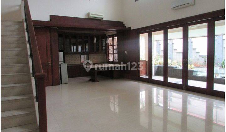 A 2 storey, 4 bedroom, stand alone house located in Cilandak, Jakarta with 3 bathrooms, a pool and a yard. 1