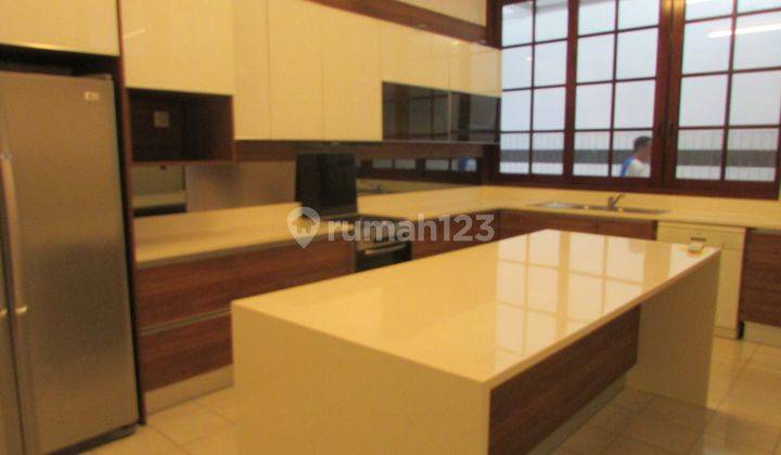 A 2 storey, 4 bedroom, stand alone house located in Kebayoran Baru, Jakarta with 3 bathrooms, a pool and a yard. 2