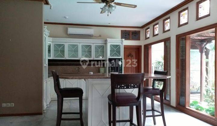 A 2 Storey, 4 Bedroom, Stand Alone House Located In Pondok Indah, Jakarta With 3+1 Bathrooms, 1 Study, A Pool And A Yard. 1