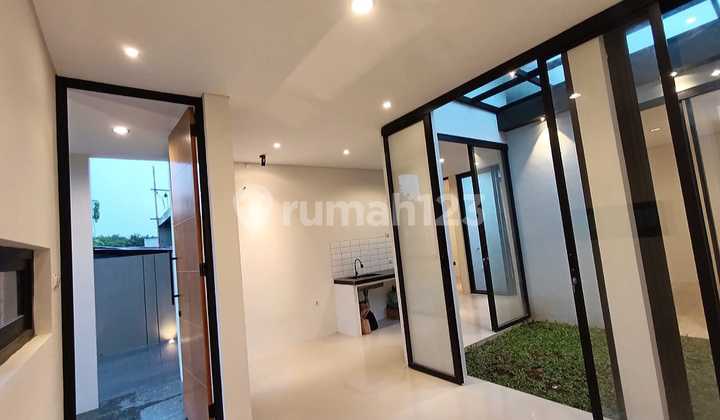 Experience the Sensation of a Charming Villa Amidst Green Rice Fields - A Beautiful Villa Ready to Occupy, Around 700 Million with Certificate in Hand, Location Near Jl. Kaliurang KM 11. 2