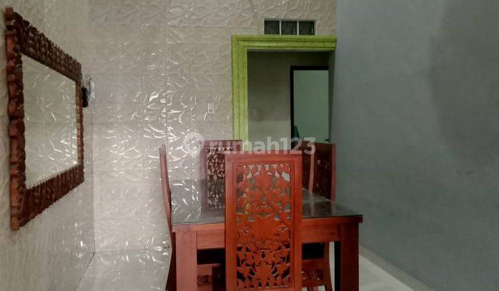 RUMAH BESERTA ISI NYA 12
