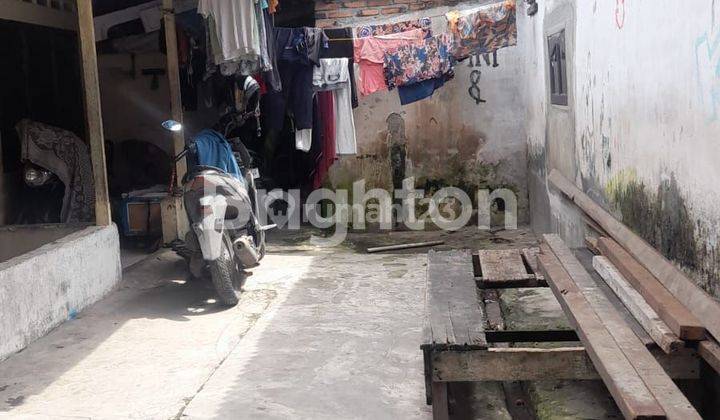 Rumah lama pinggir jalan besar 2