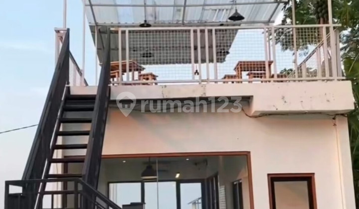 tampak depan ruang usaha cafe view city