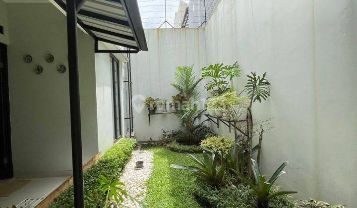 RUMAH DIJALAN BOULEVARD KOMPLEK KENCANA LOKA BSD 2