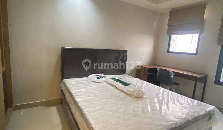 Apartemen Evencio Margonda 1 Kamar Tidur Furnished Baru 1