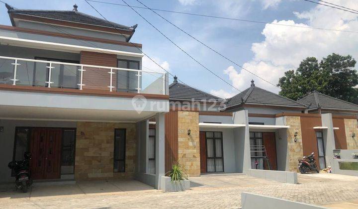 Rumah cluster lokasi pinggir jalan harga murah  2