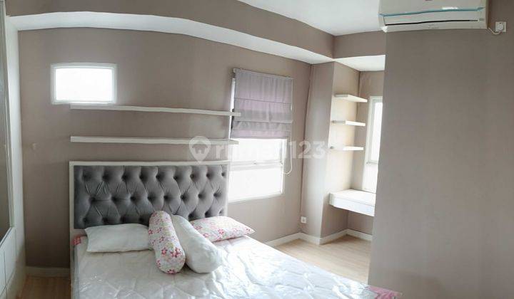 kamar tidur apartemen grand icon caman jatibening