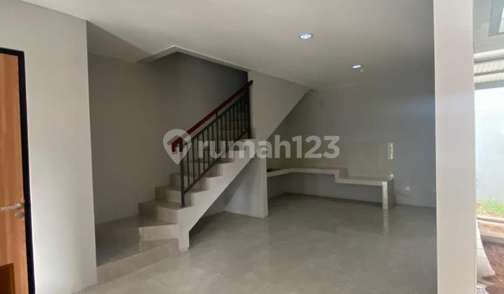 Rumah Modern Minimalis Dalam Cluster Di Grand Wisata 2