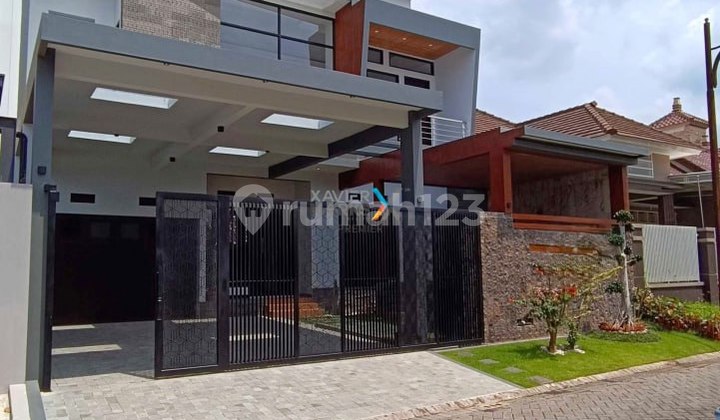 Rumah Baru Gress Desain Modern di Araya Golf, Malang 2