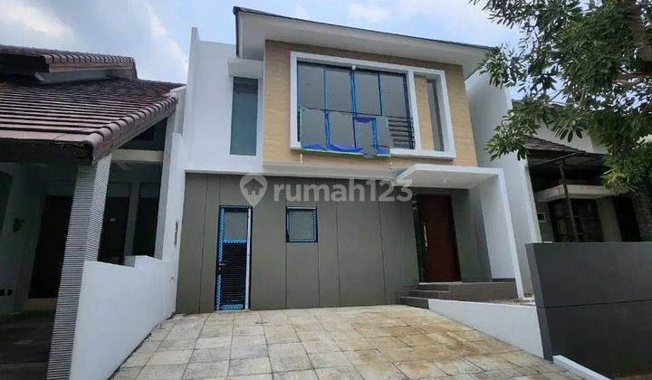 Rumah Woodland Taman Puspa Raya TPR Citraland Surabaya Barat 1